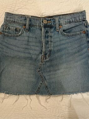 Light Blue Denim Mini Skirt with Frayed Hem
